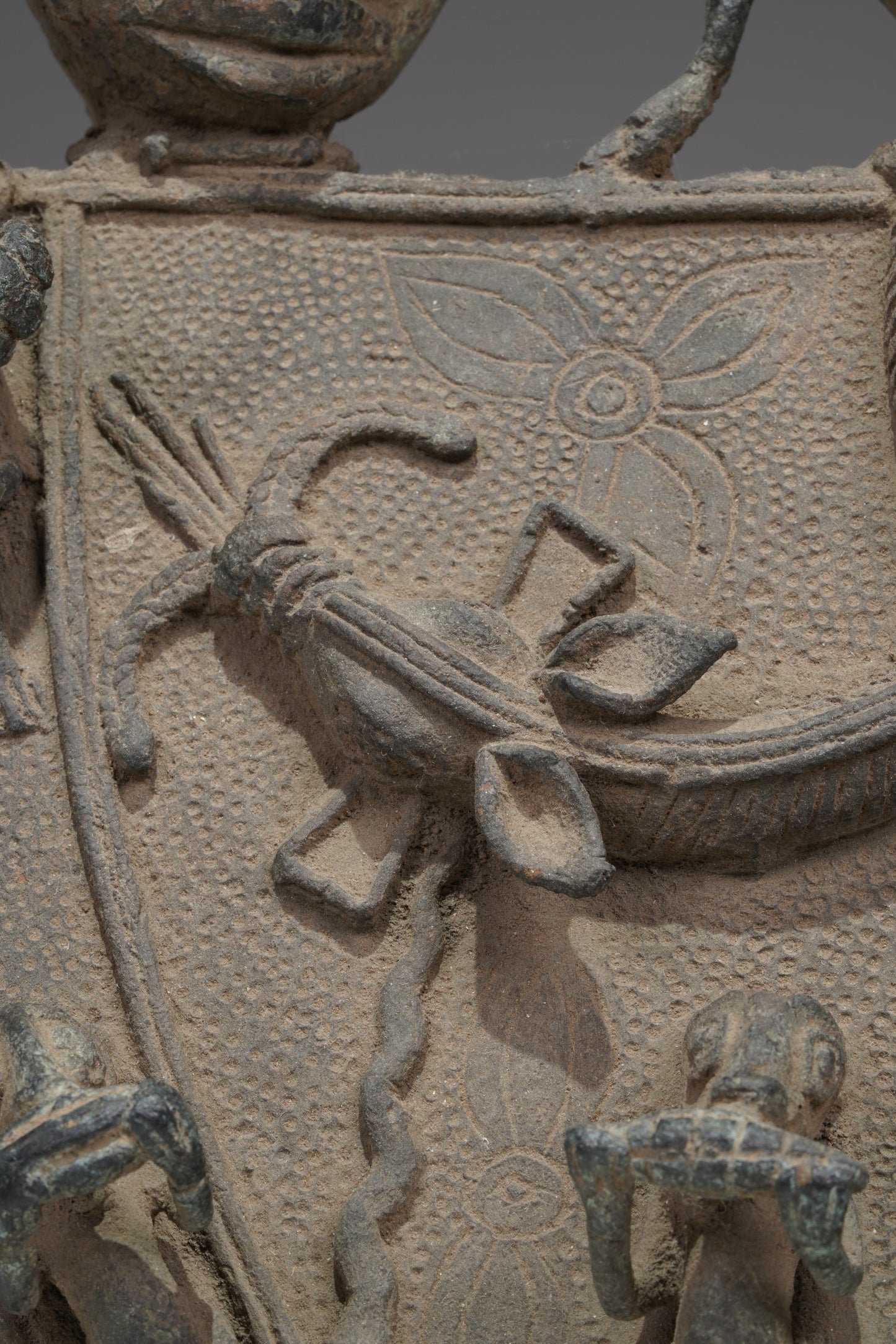A Bronze Plaque in the style of Benin/ Ife