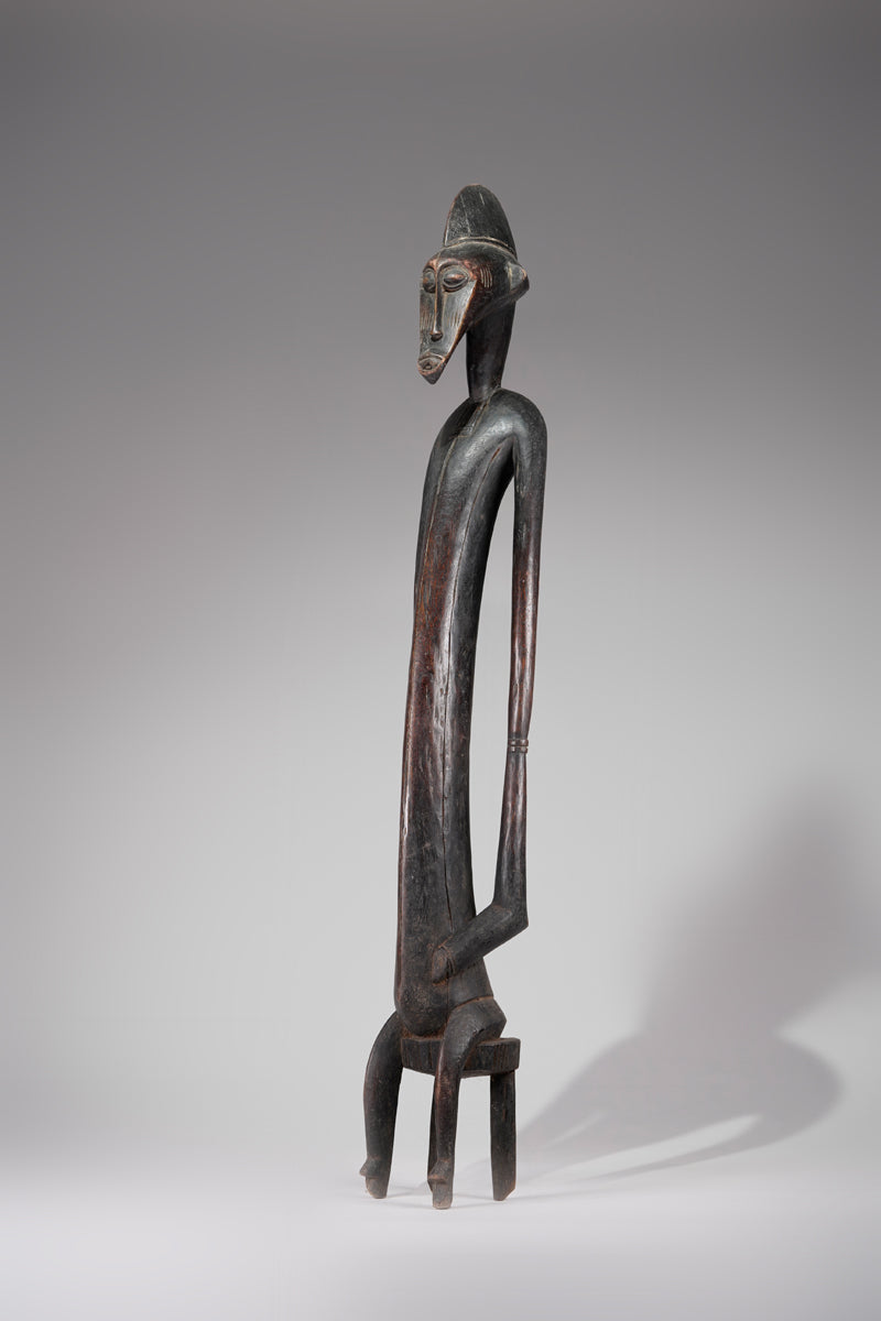 A male Senufo Rhythm Pounder, called Déblé
