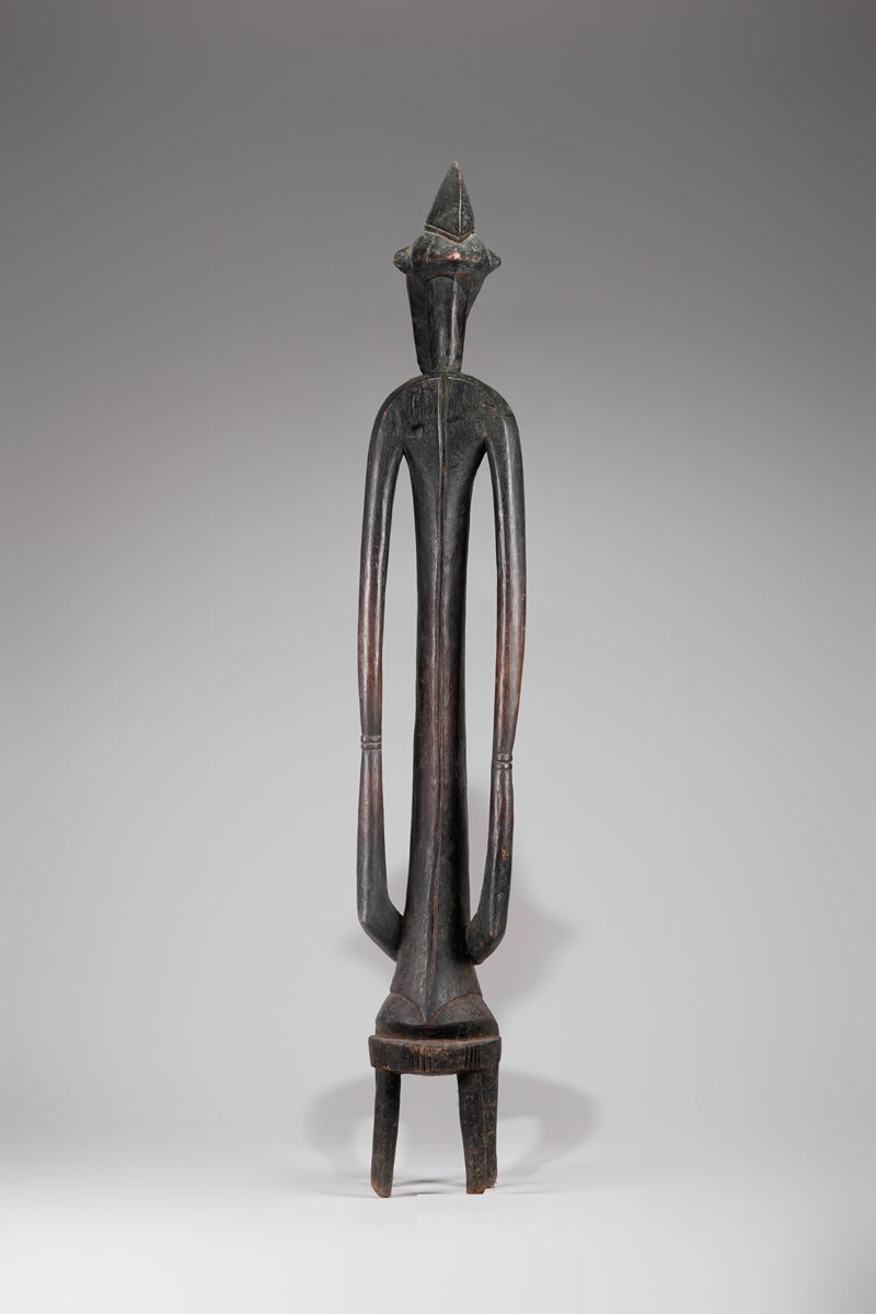 A male Senufo Rhythm Pounder, called Déblé