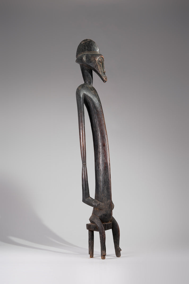 A male Senufo Rhythm Pounder, called Déblé