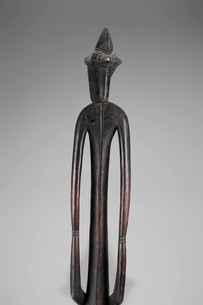 A male Senufo Rhythm Pounder, called Déblé
