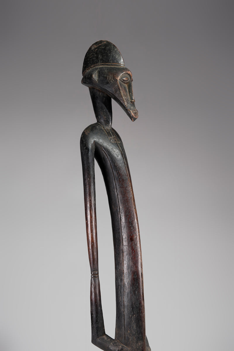 A male Senufo Rhythm Pounder, called Déblé