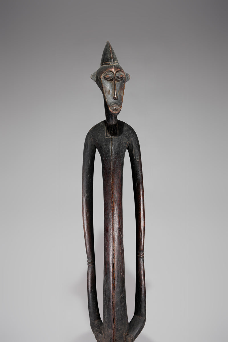 A male Senufo Rhythm Pounder, called Déblé