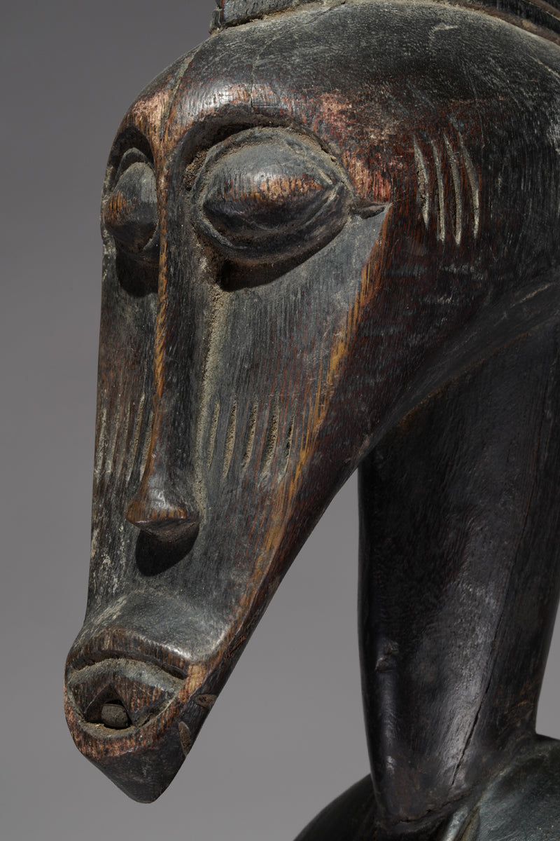 A male Senufo Rhythm Pounder, called Déblé