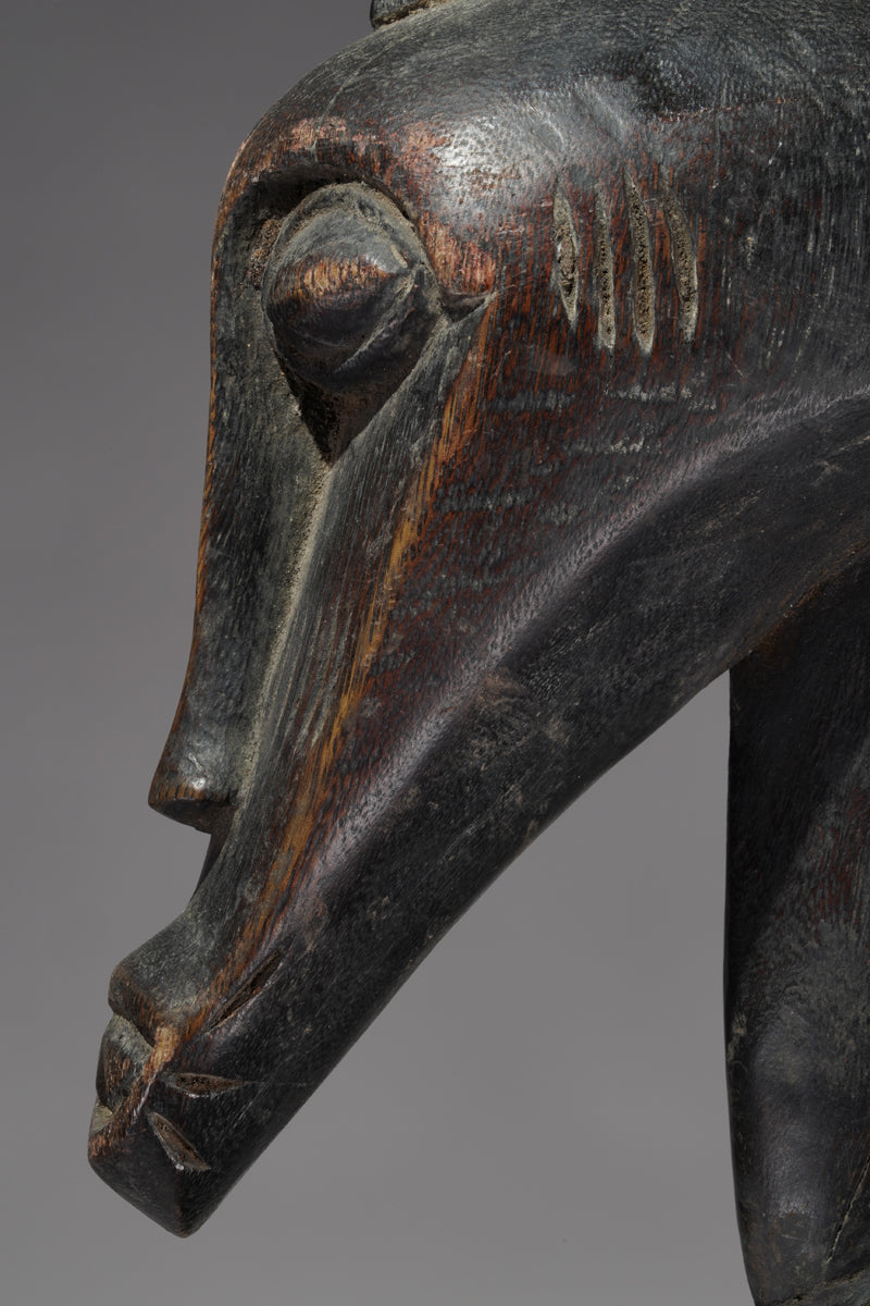 A male Senufo Rhythm Pounder, called Déblé