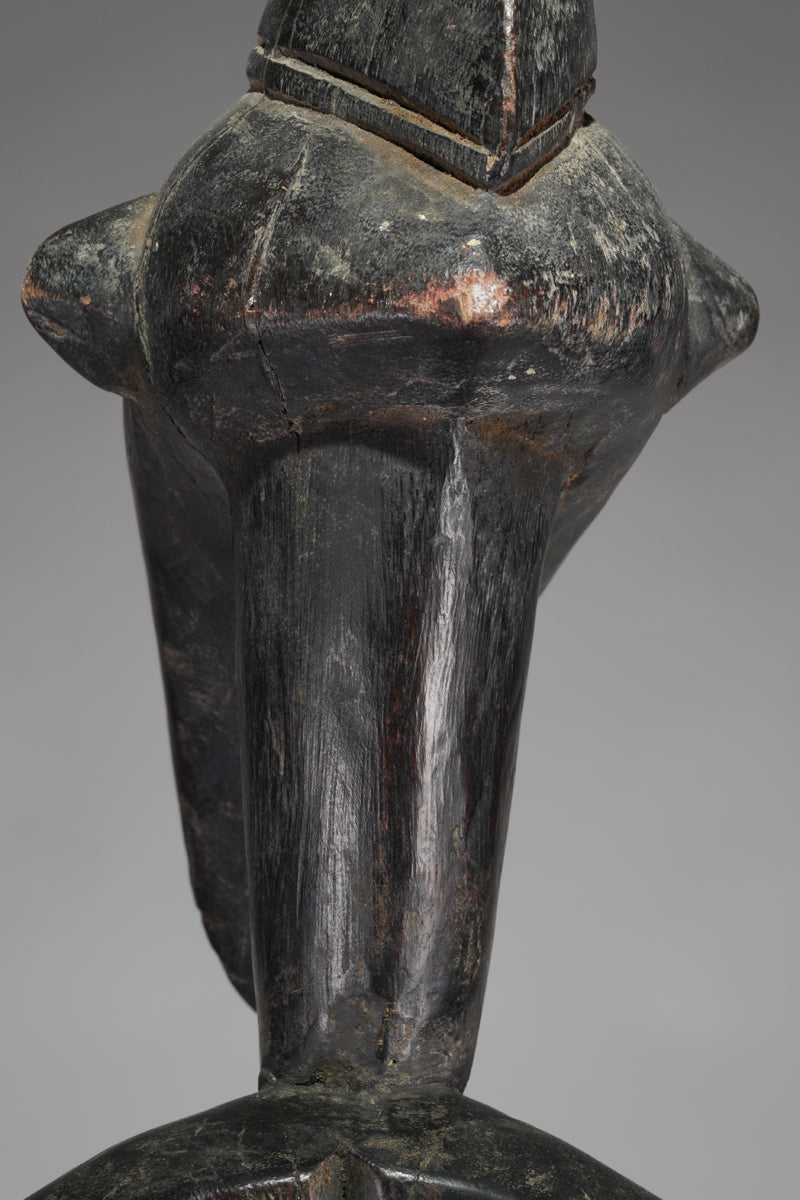 A male Senufo Rhythm Pounder, called Déblé