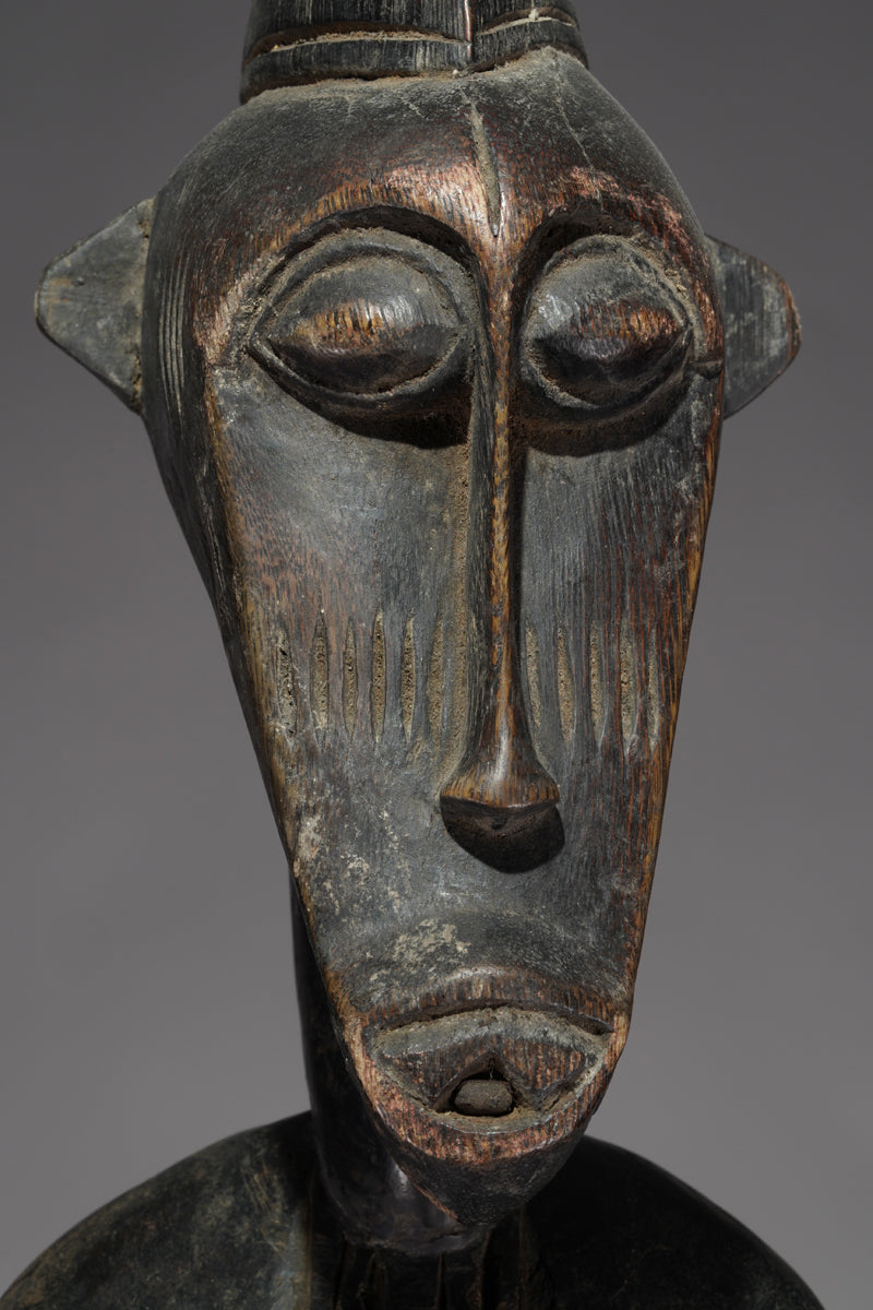 A male Senufo Rhythm Pounder, called Déblé