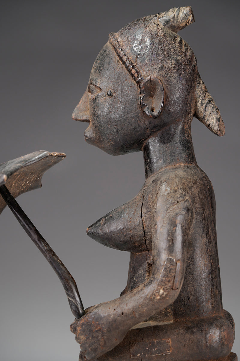 A playful sculpture of the "Master of the Parasols"