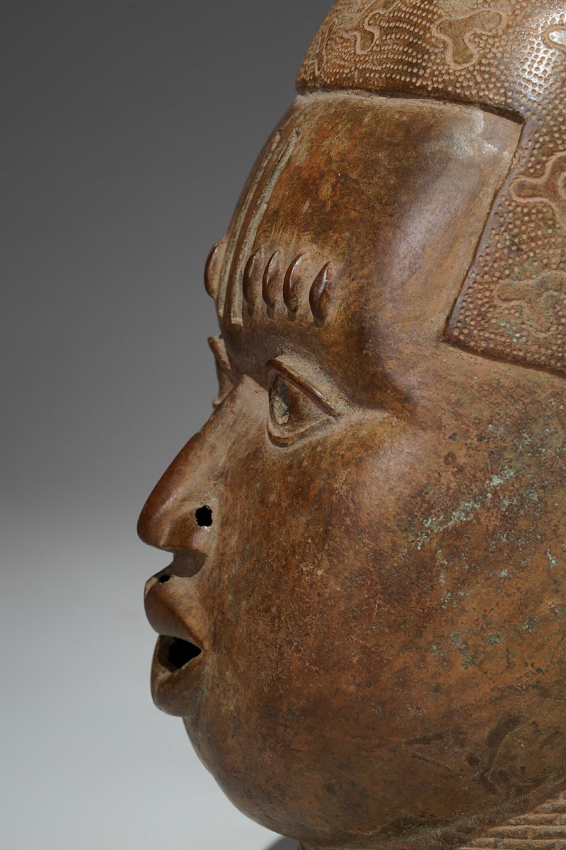 An bronze head in the style of Benin