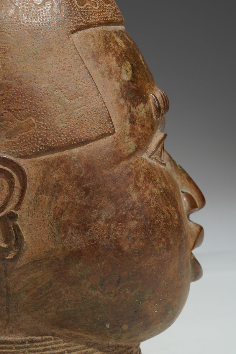 An bronze head in the style of Benin