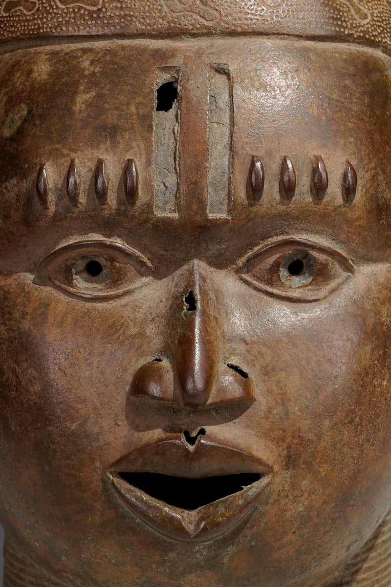 An bronze head in the style of Benin