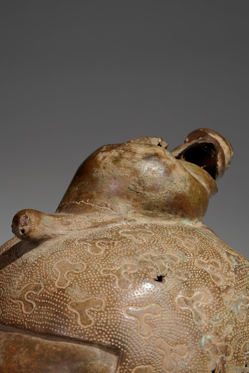 An bronze head in the style of Benin
