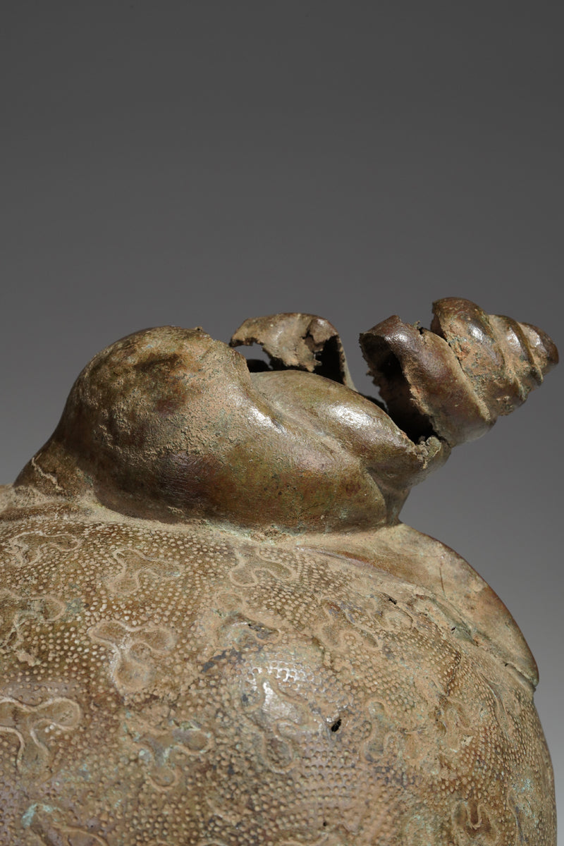 An bronze head in the style of Benin
