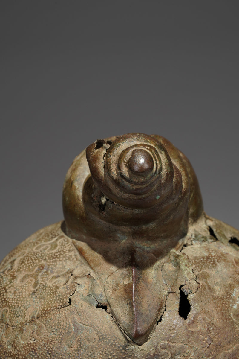An bronze head in the style of Benin