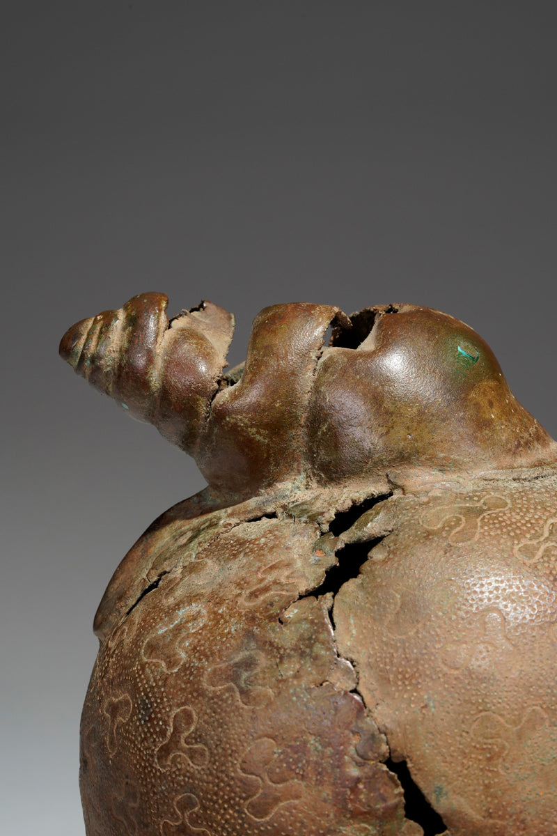 An bronze head in the style of Benin