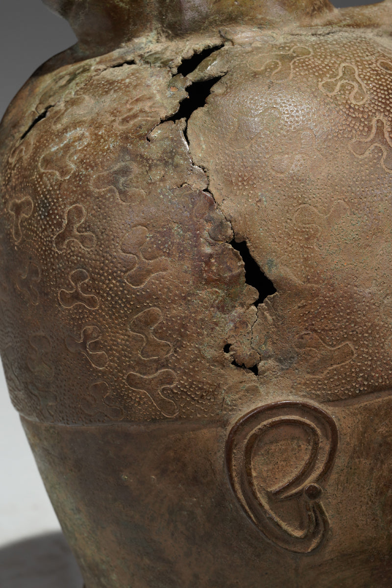 An bronze head in the style of Benin