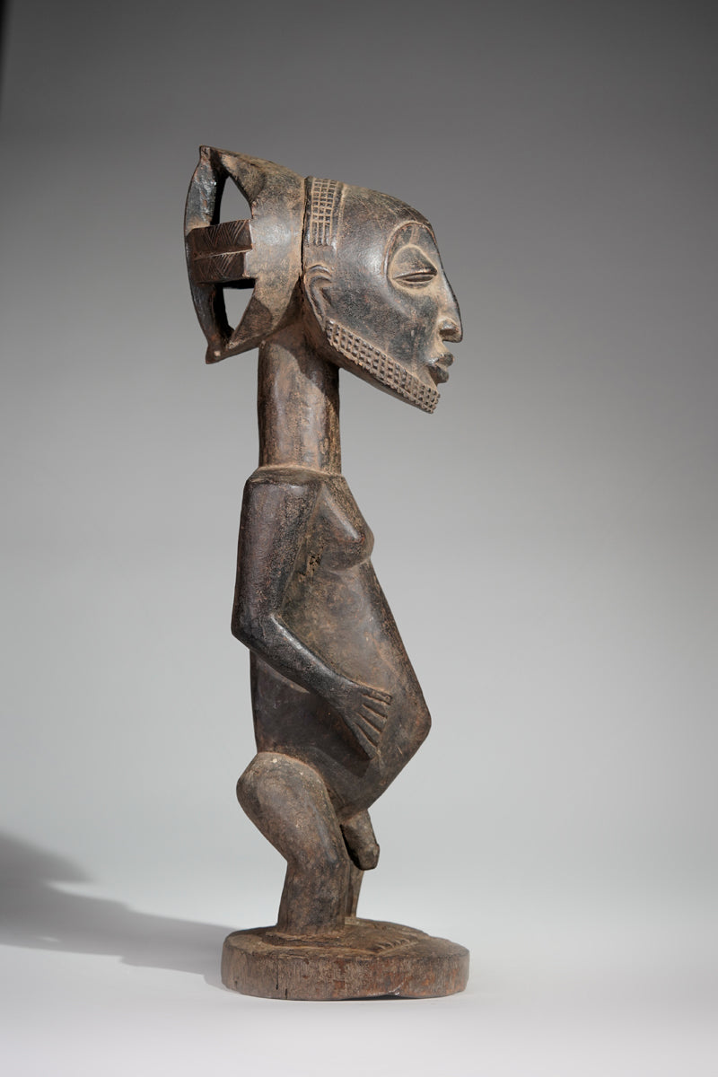 A male Hemba sculpture