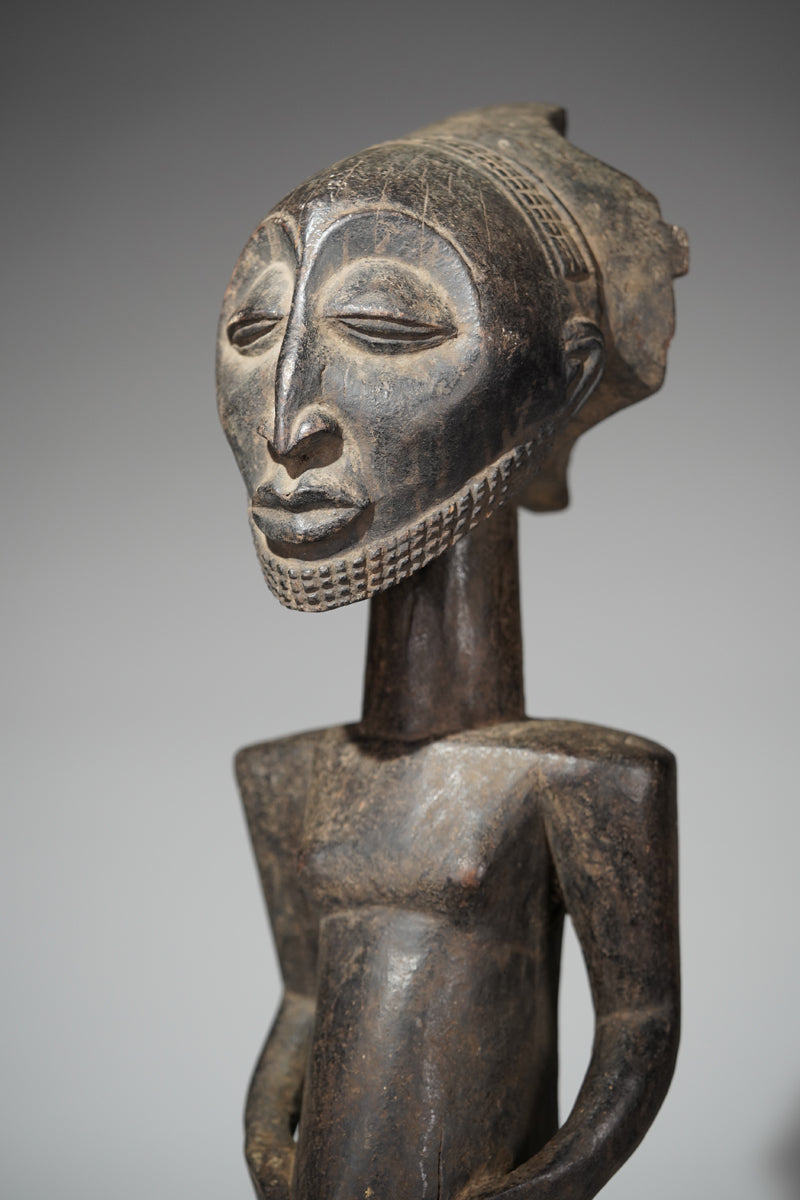 A male Hemba sculpture