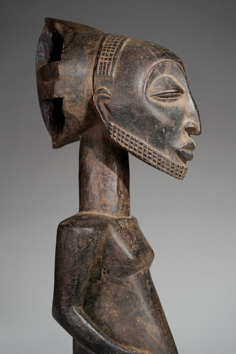 A male Hemba sculpture