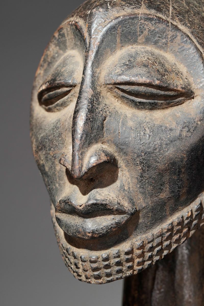 A male Hemba sculpture