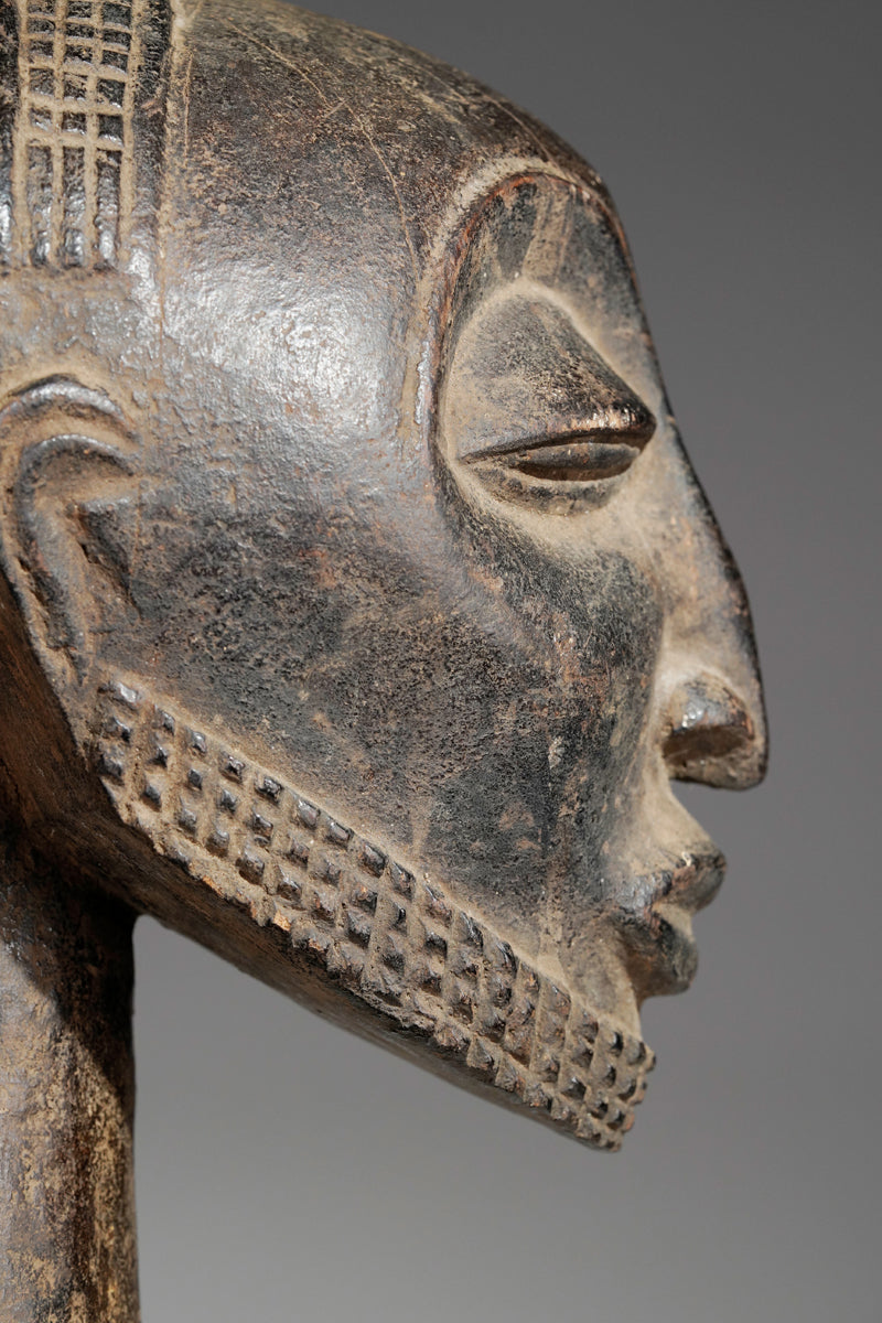 A male Hemba sculpture