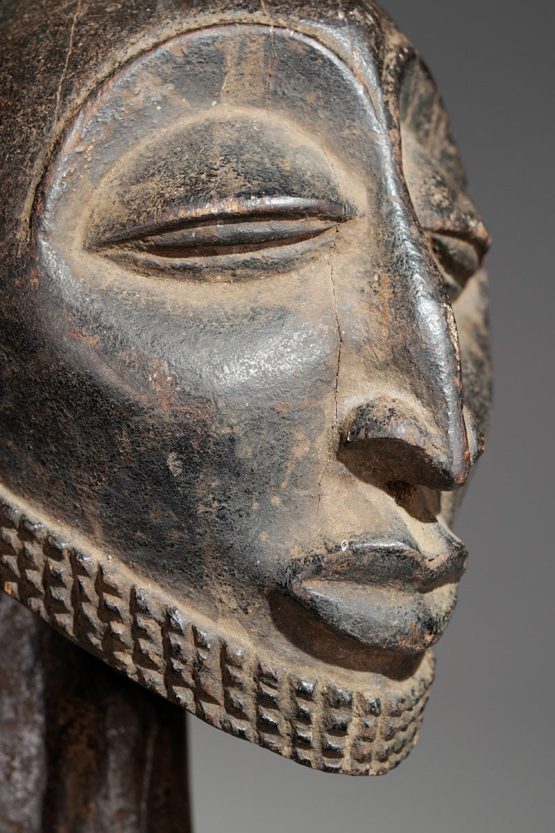 A male Hemba sculpture