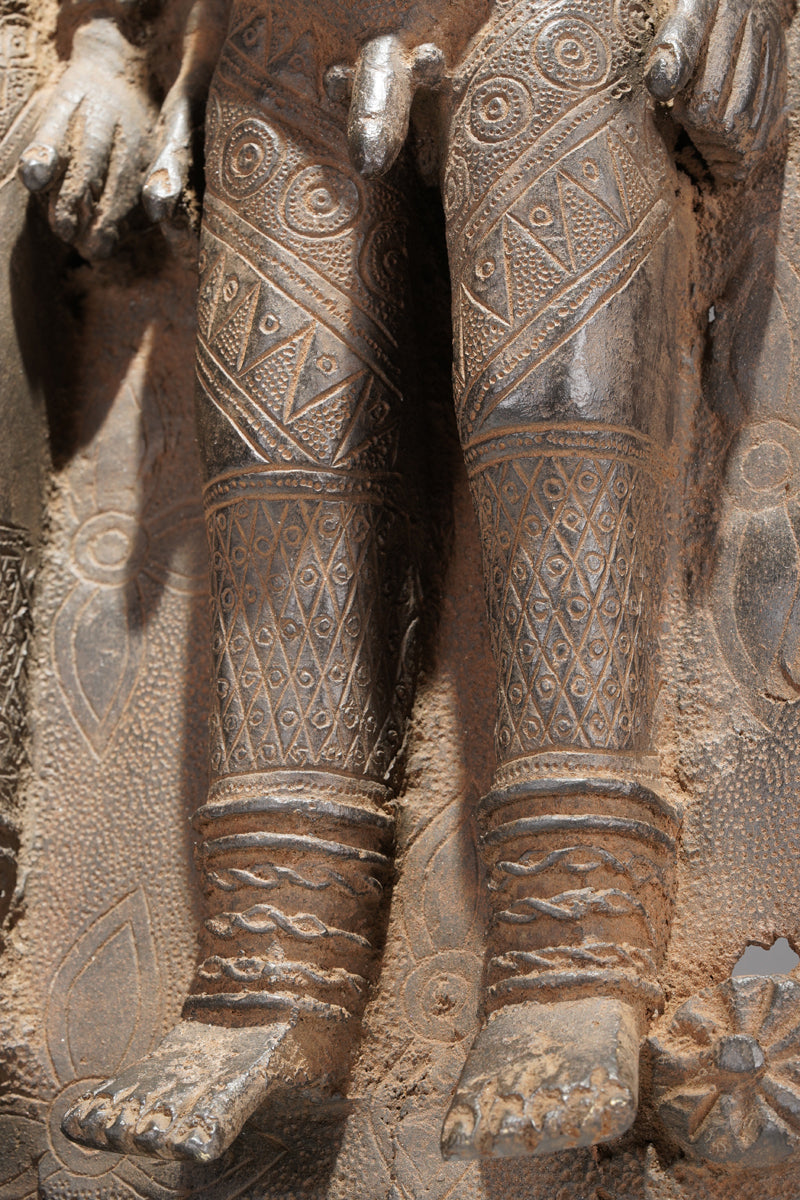 A Benin plate in the style of Benin