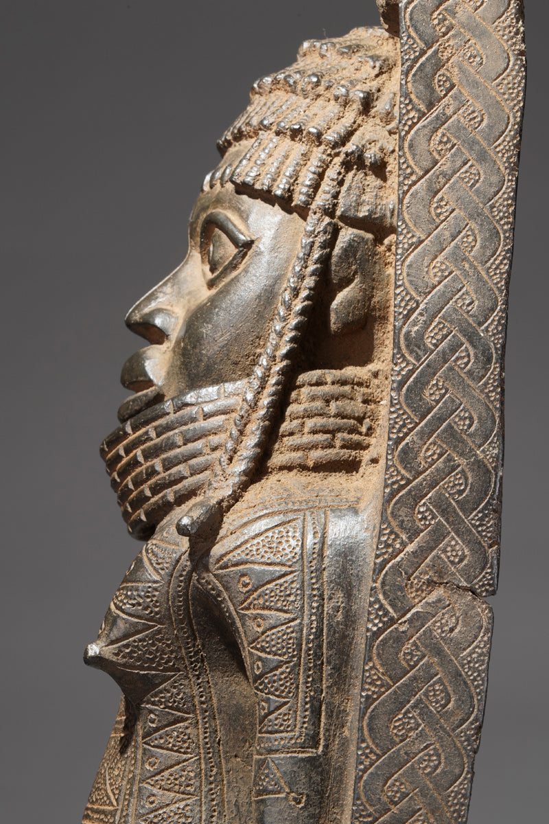 A Benin plate in the style of Benin