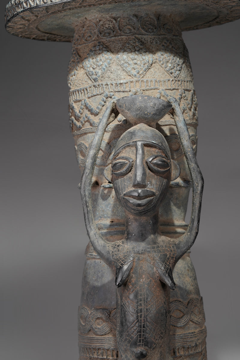 An Afo bronze stool