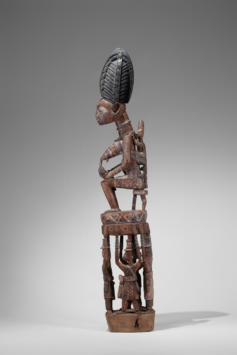 A Yoruba pole carving