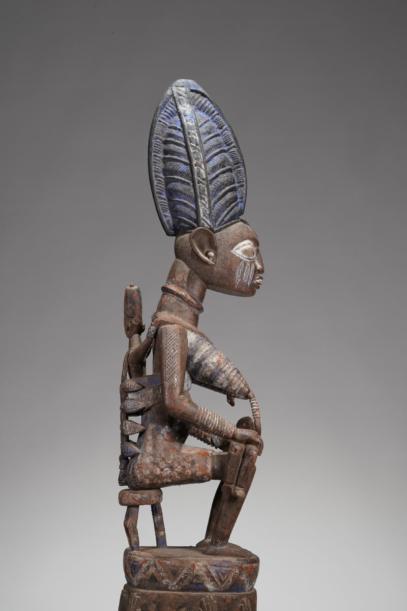 A Yoruba pole carving