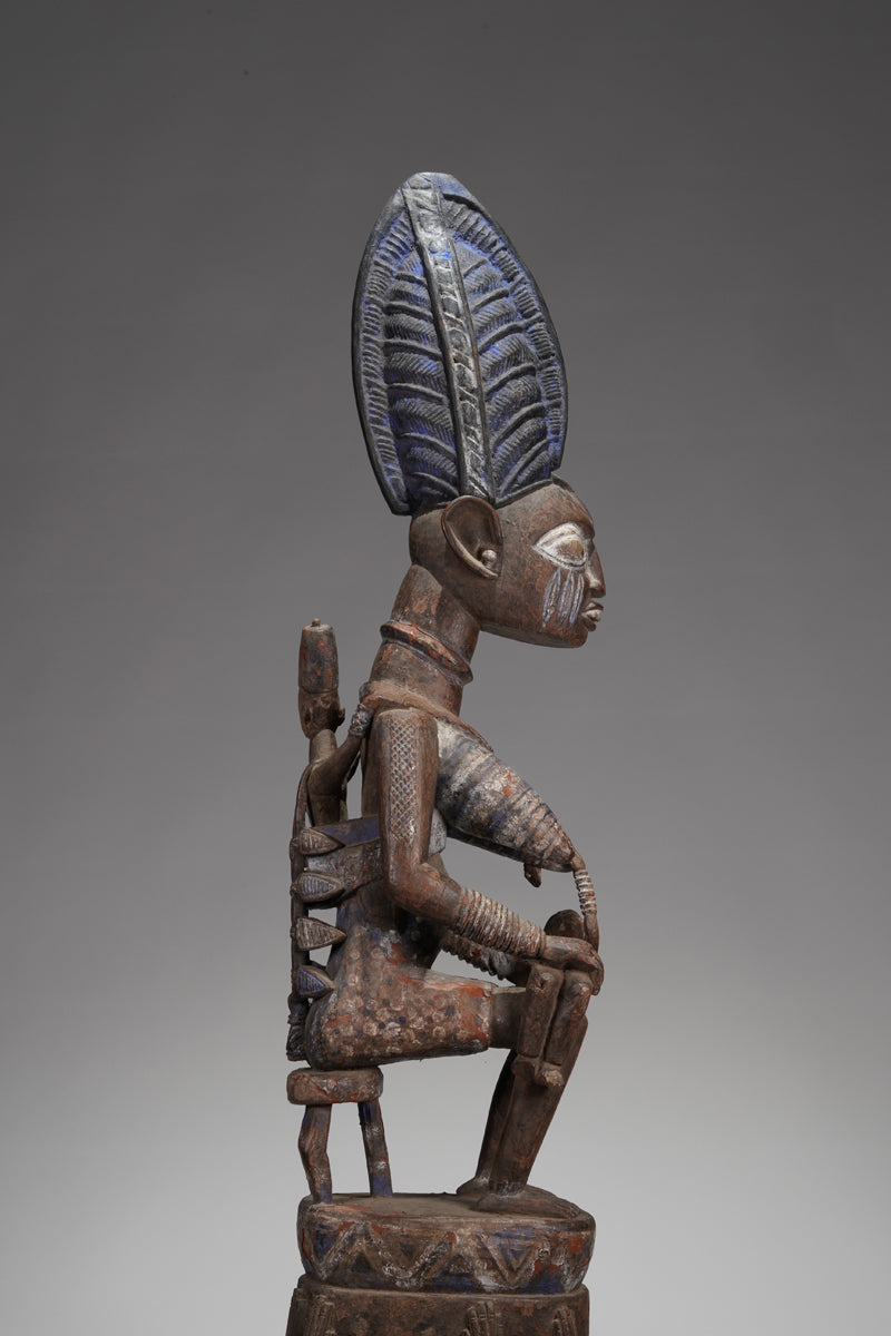A Yoruba pole carving