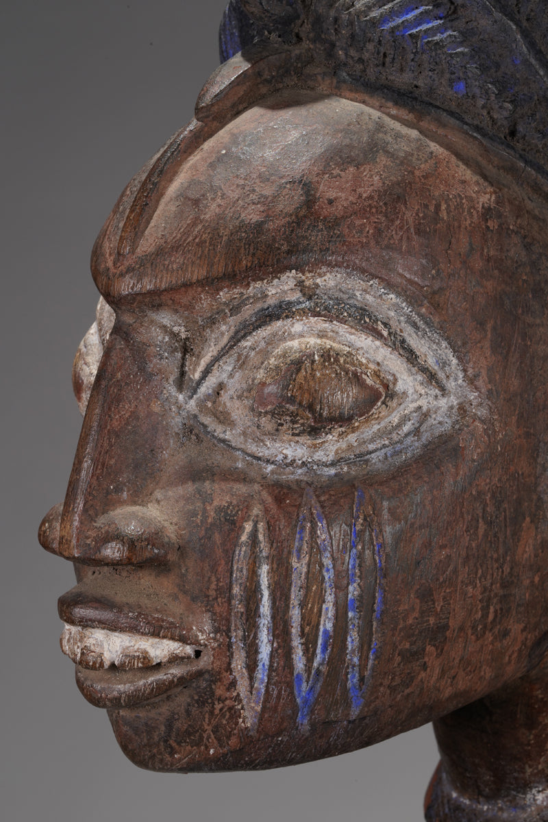 A Yoruba pole carving