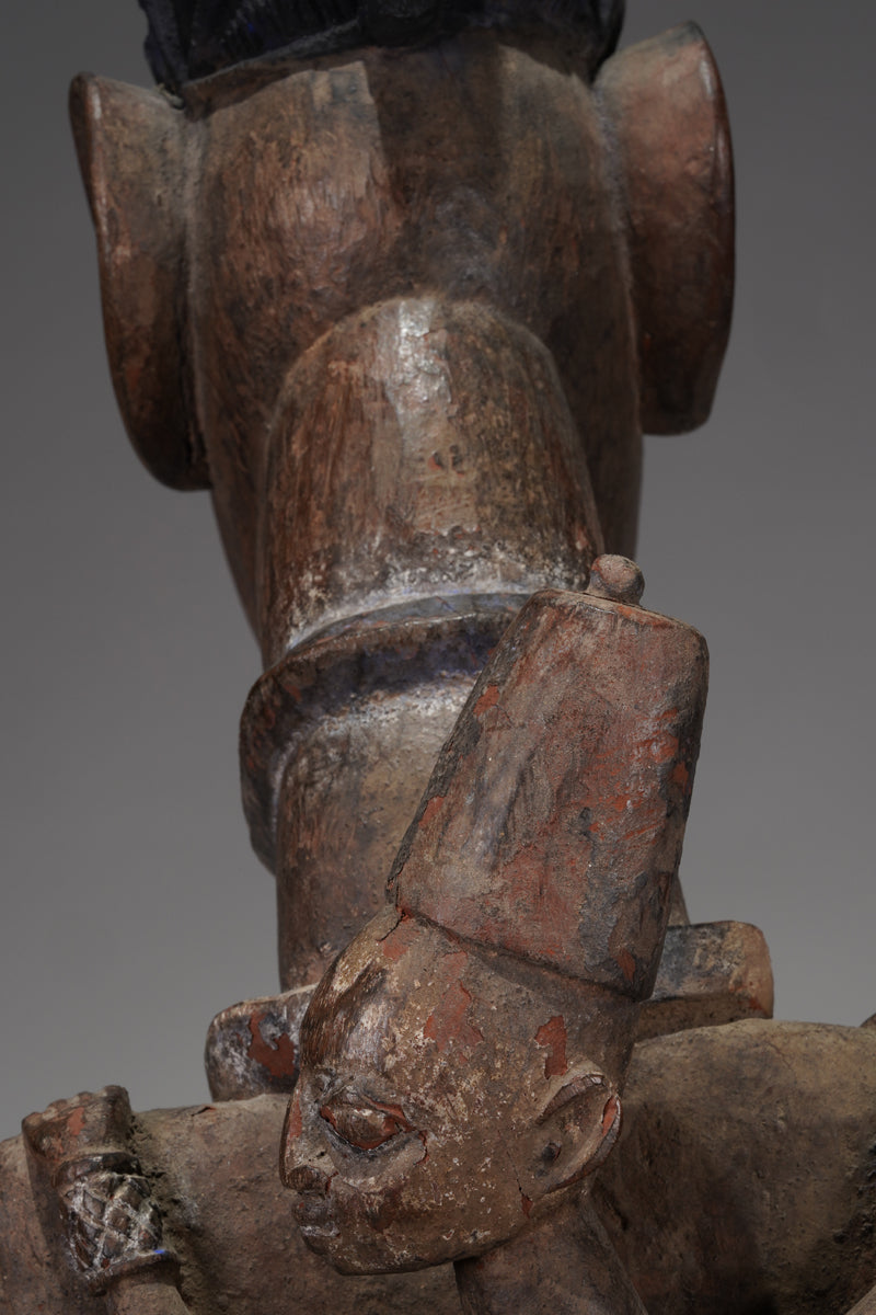 A Yoruba pole carving