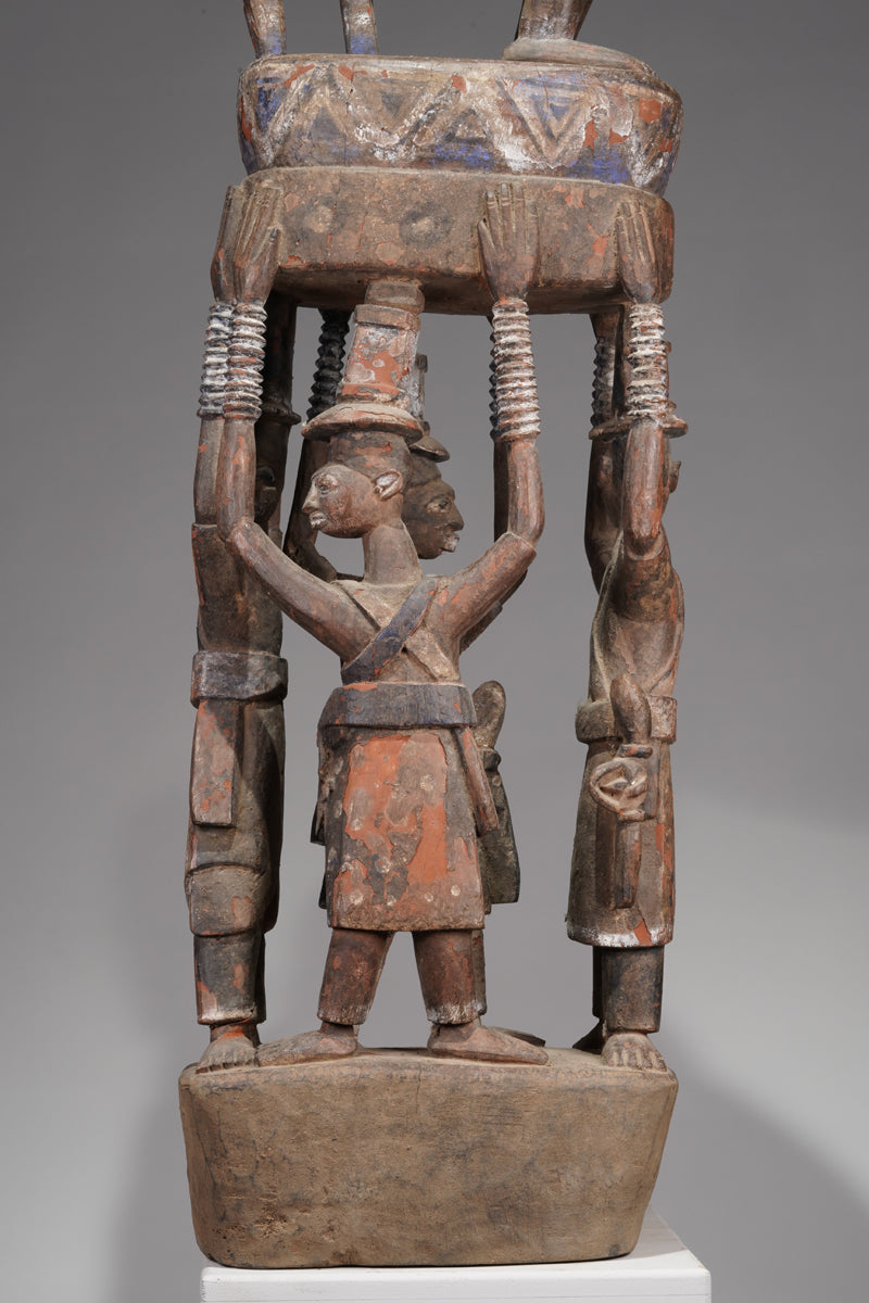 A Yoruba pole carving