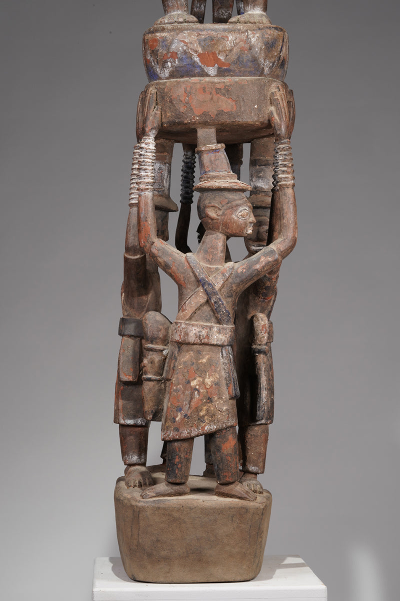 A Yoruba pole carving