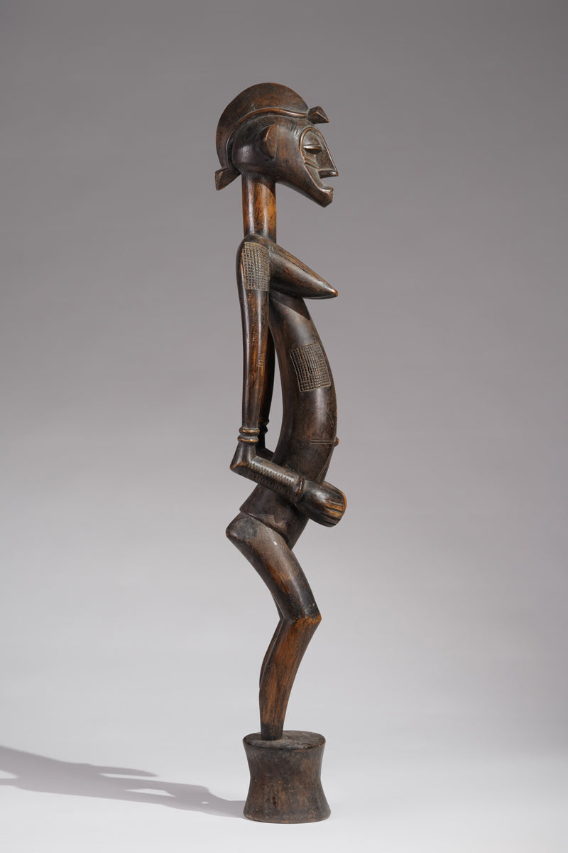 An outstanding female Senufo Déblé or guardian sculpture