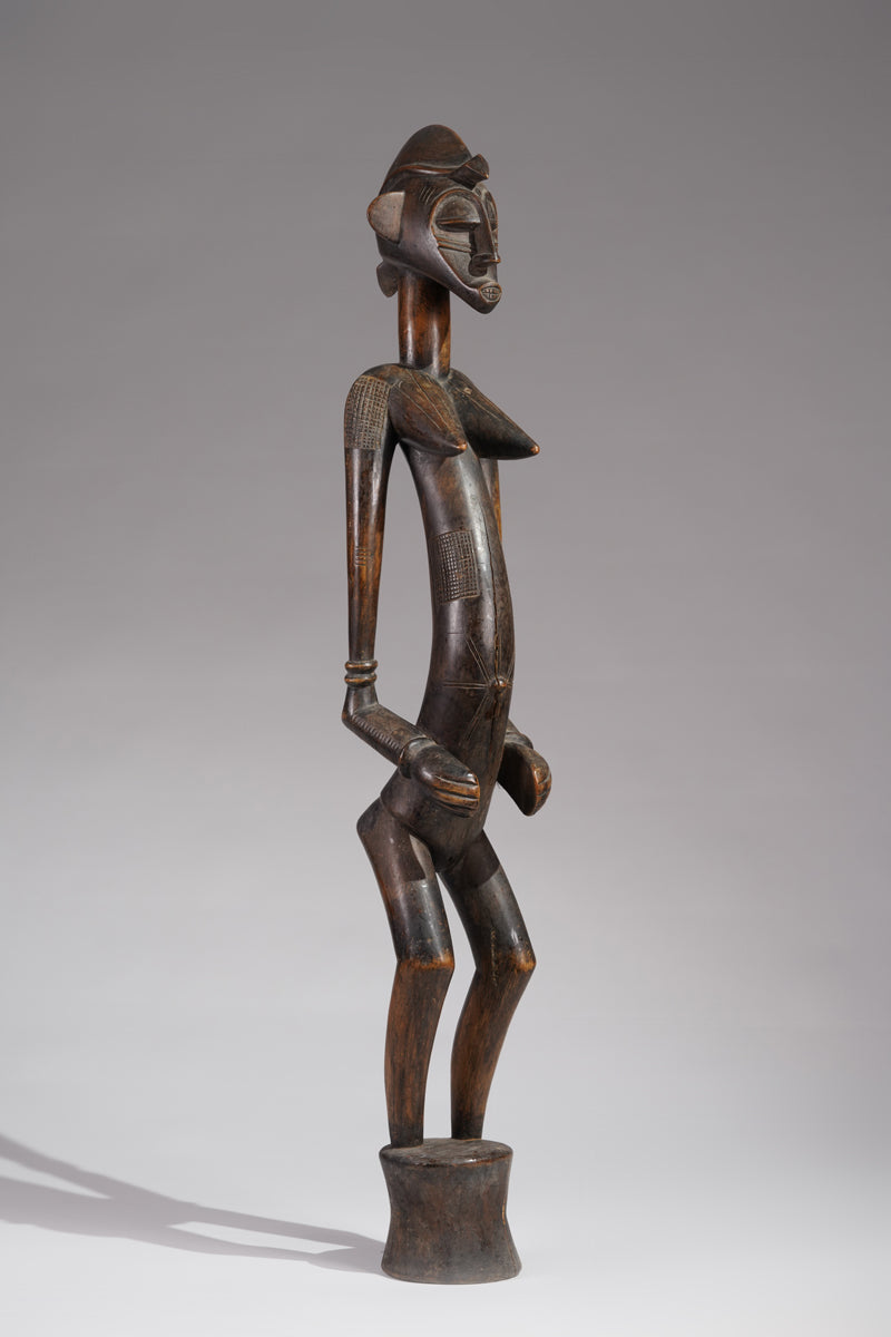 An outstanding female Senufo Déblé or guardian sculpture