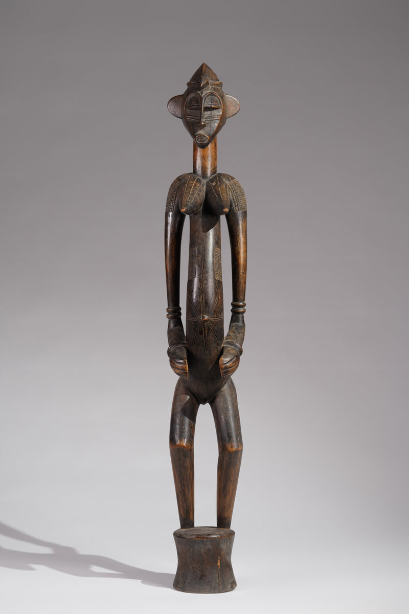 An outstanding female Senufo Déblé or guardian sculpture