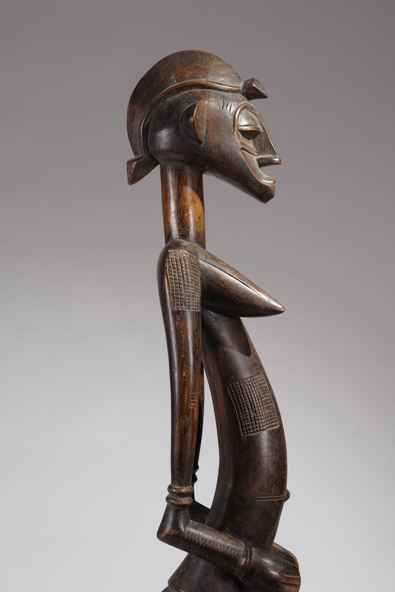 An outstanding female Senufo Déblé or guardian sculpture