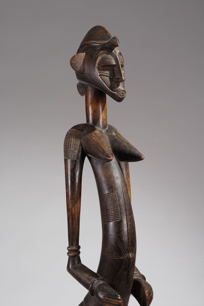 An outstanding female Senufo Déblé or guardian sculpture