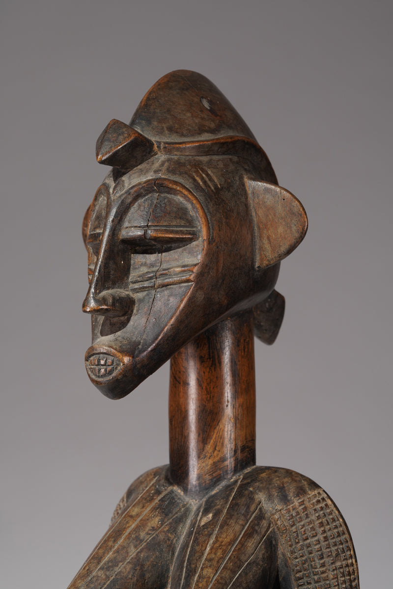 An outstanding female Senufo Déblé or guardian sculpture