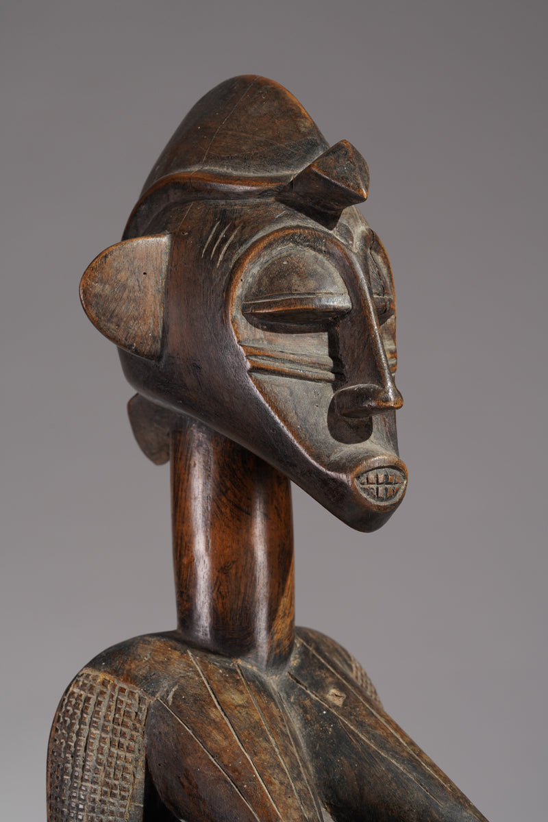 An outstanding female Senufo Déblé or guardian sculpture