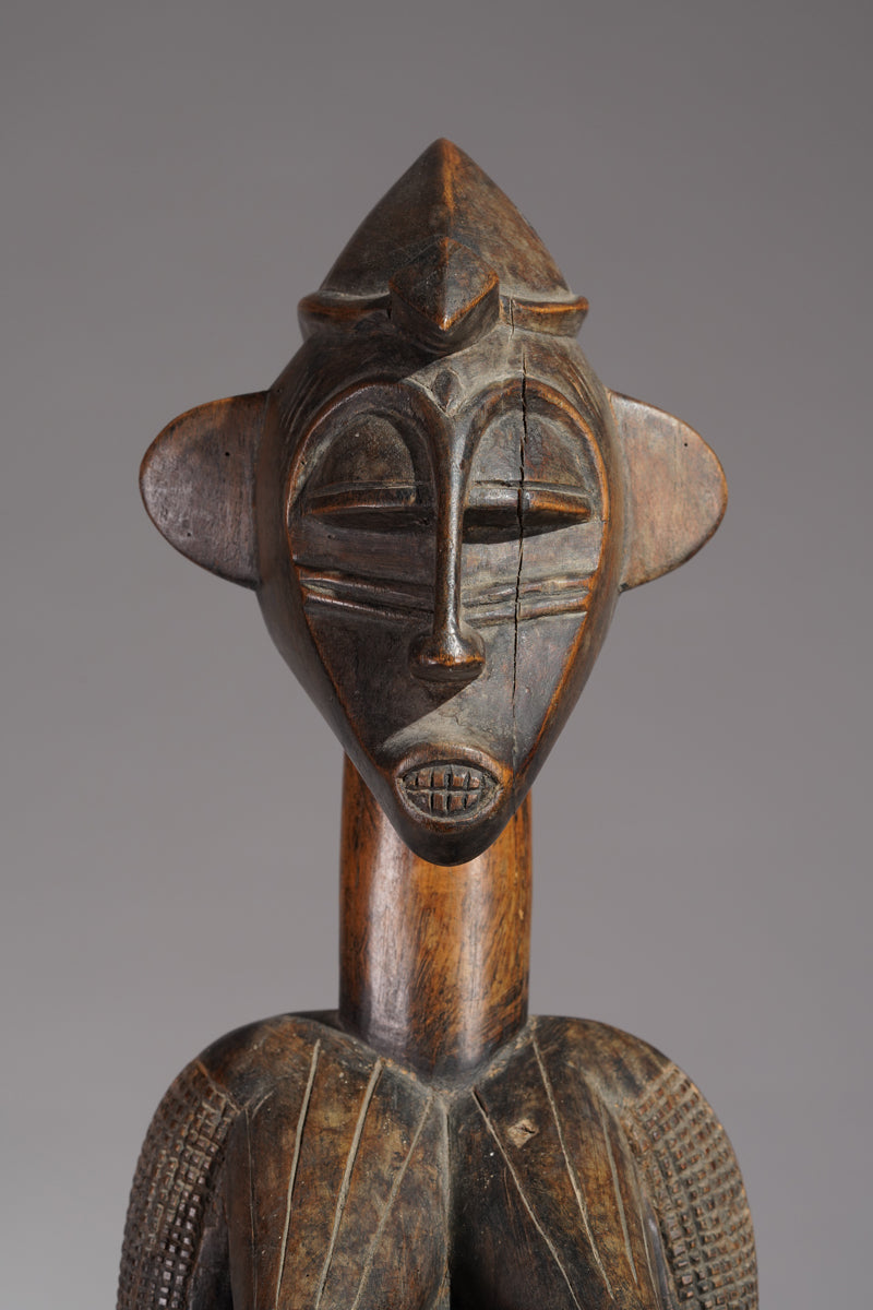 An outstanding female Senufo Déblé or guardian sculpture