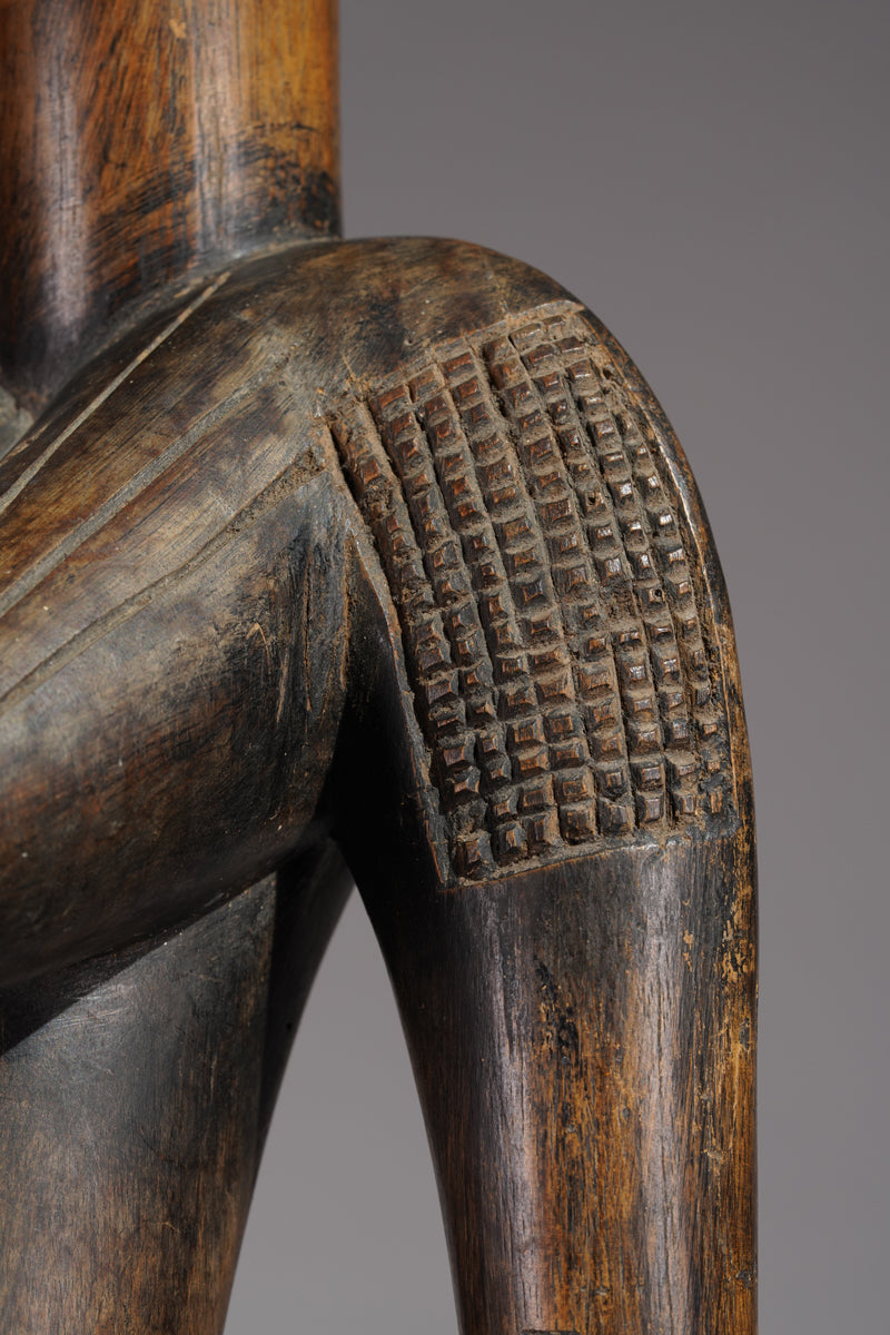 An outstanding female Senufo Déblé or guardian sculpture