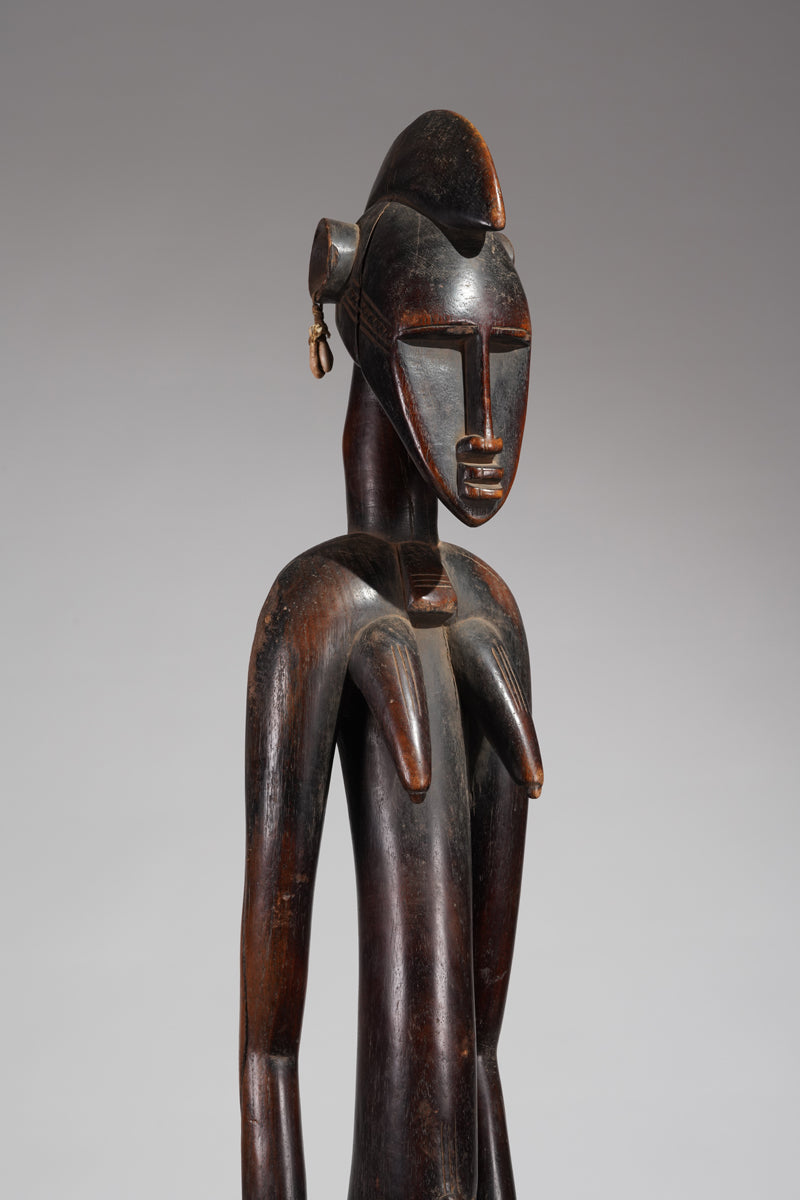 A Senufo Rhythmpounder, called Déblé, or a guardian sculpture