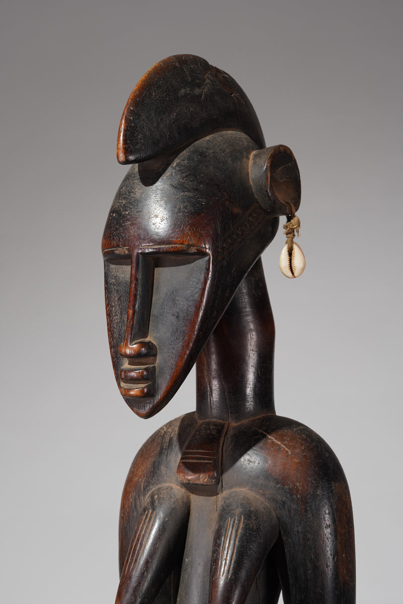 A Senufo Rhythmpounder, called Déblé, or a guardian sculpture