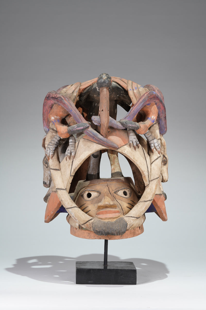 A colourful Gelede helmet mask