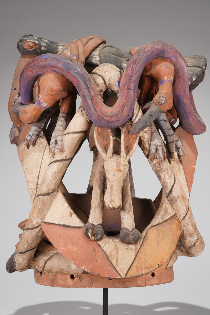 A colourful Gelede helmet mask