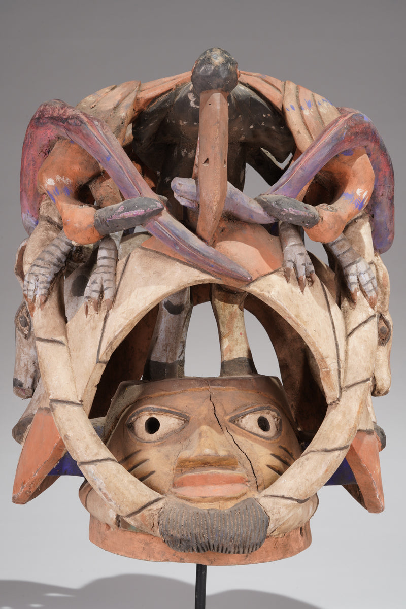 A colourful Gelede helmet mask